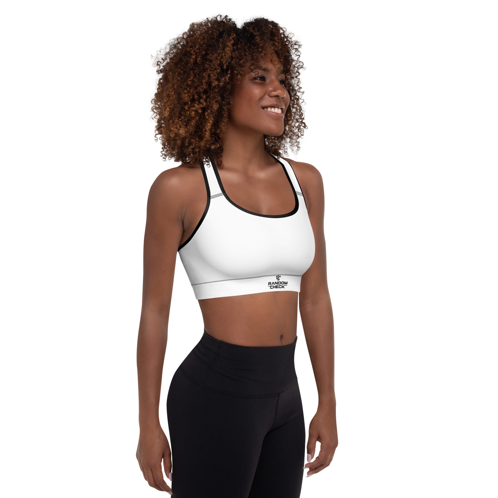 Woman wearing a white sports bra with Veltrix logo on a white background