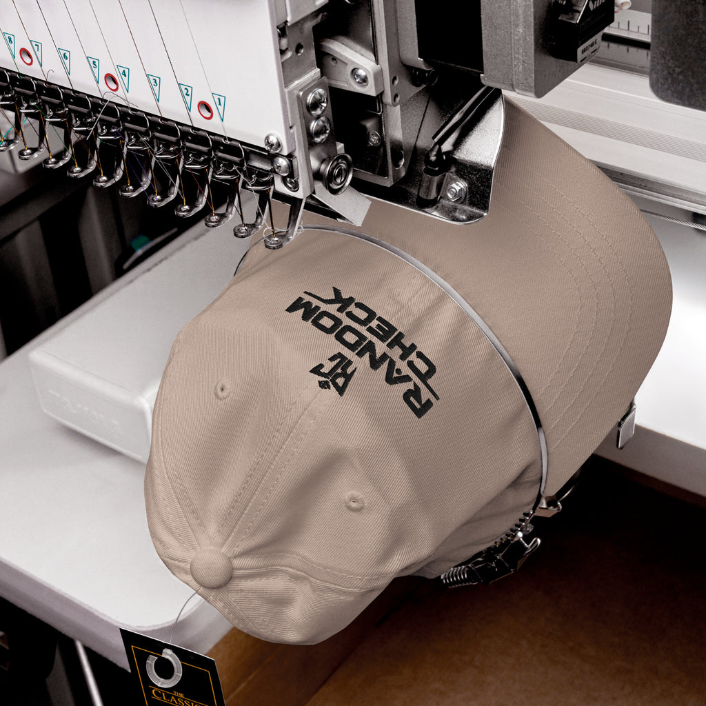 stone Classic Dad Hat front view showing Random Check logo embroidery