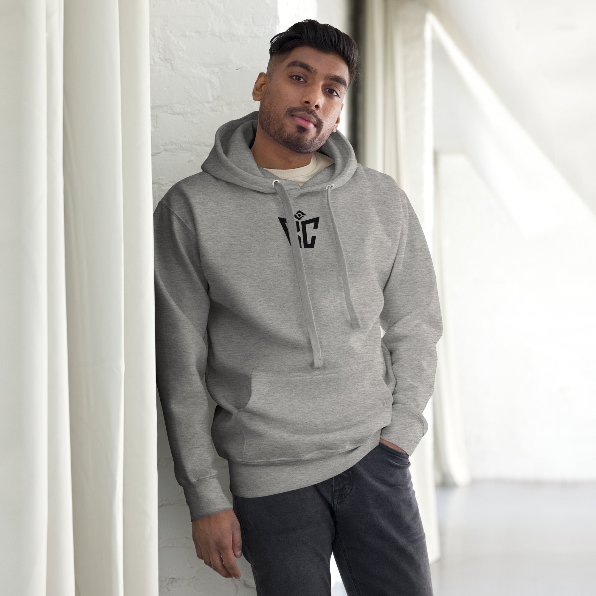 Model wearing carbon-grey Foundation Hoodie - men's premium streetwear hoodie