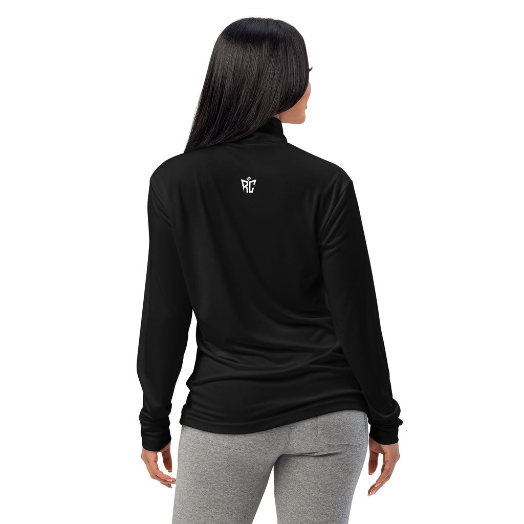 Person wearing a black long-sleeve shirt with text on the back, standing against a white background