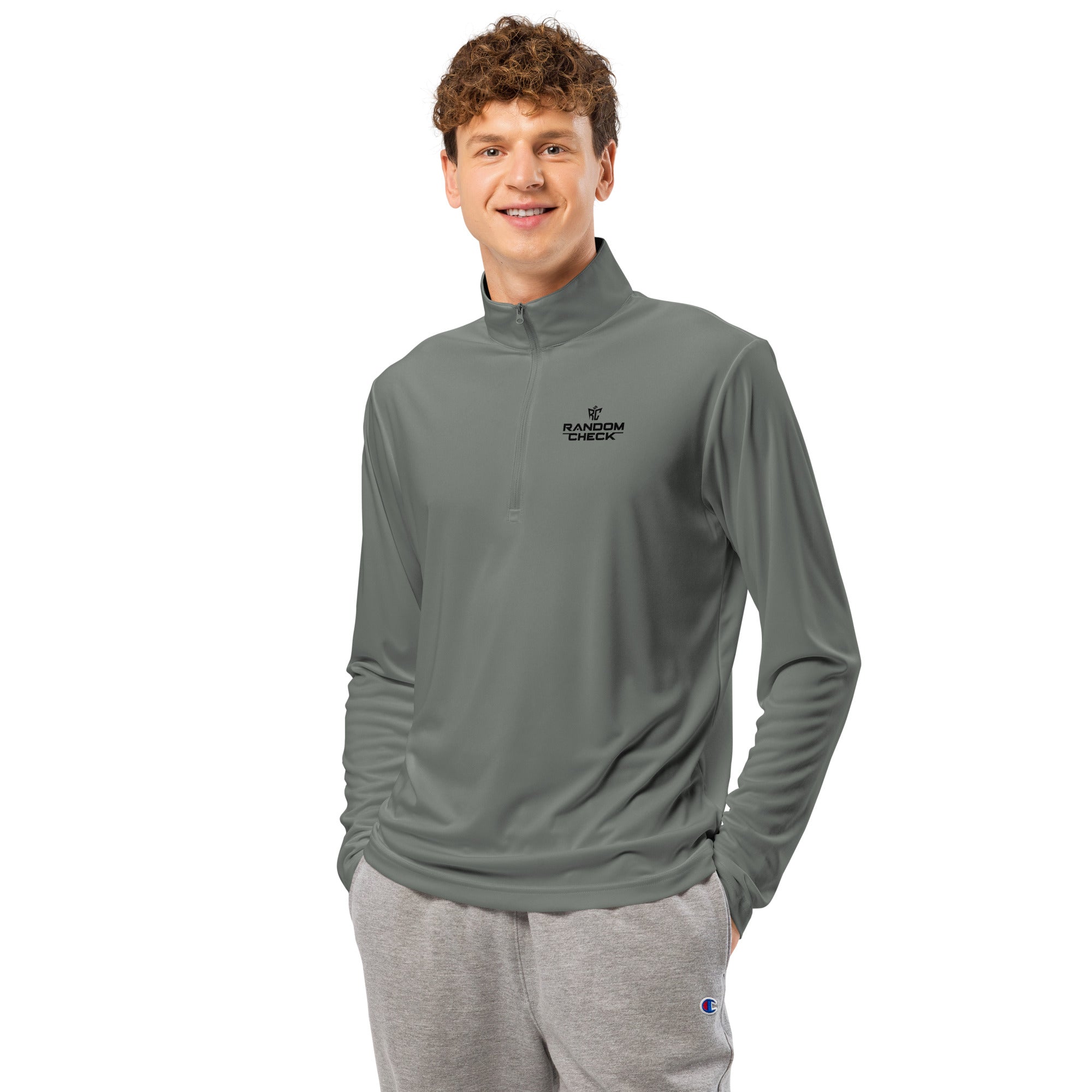 Man wearing a gray long-sleeve shirt with a logo on a white background