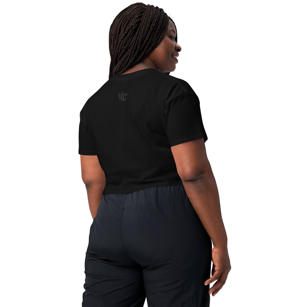 Person wearing a black outfit on a white background