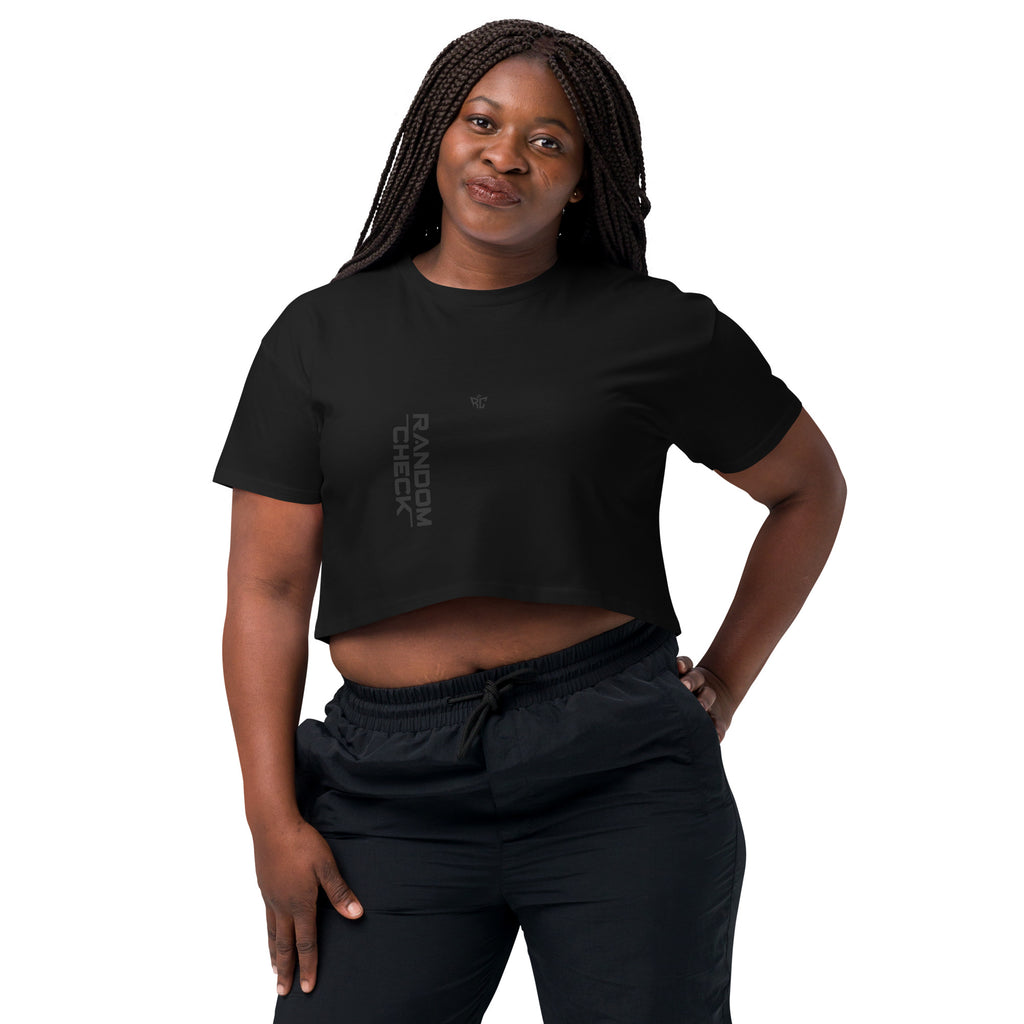 Woman wearing a black t-shirt with text on a white background