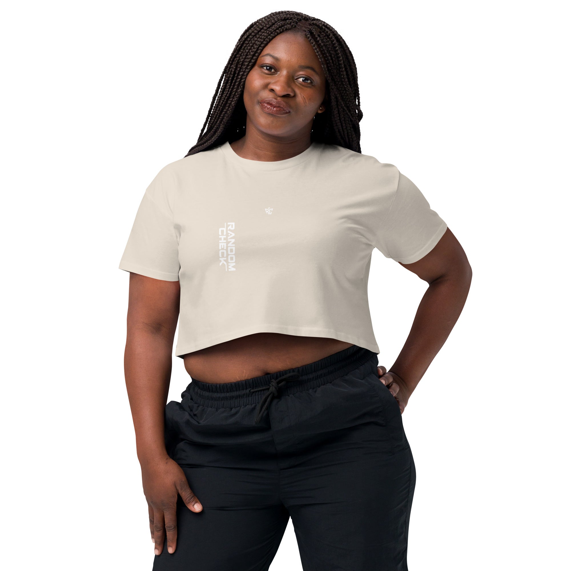 Woman wearing a white t-shirt and black pants on a white background