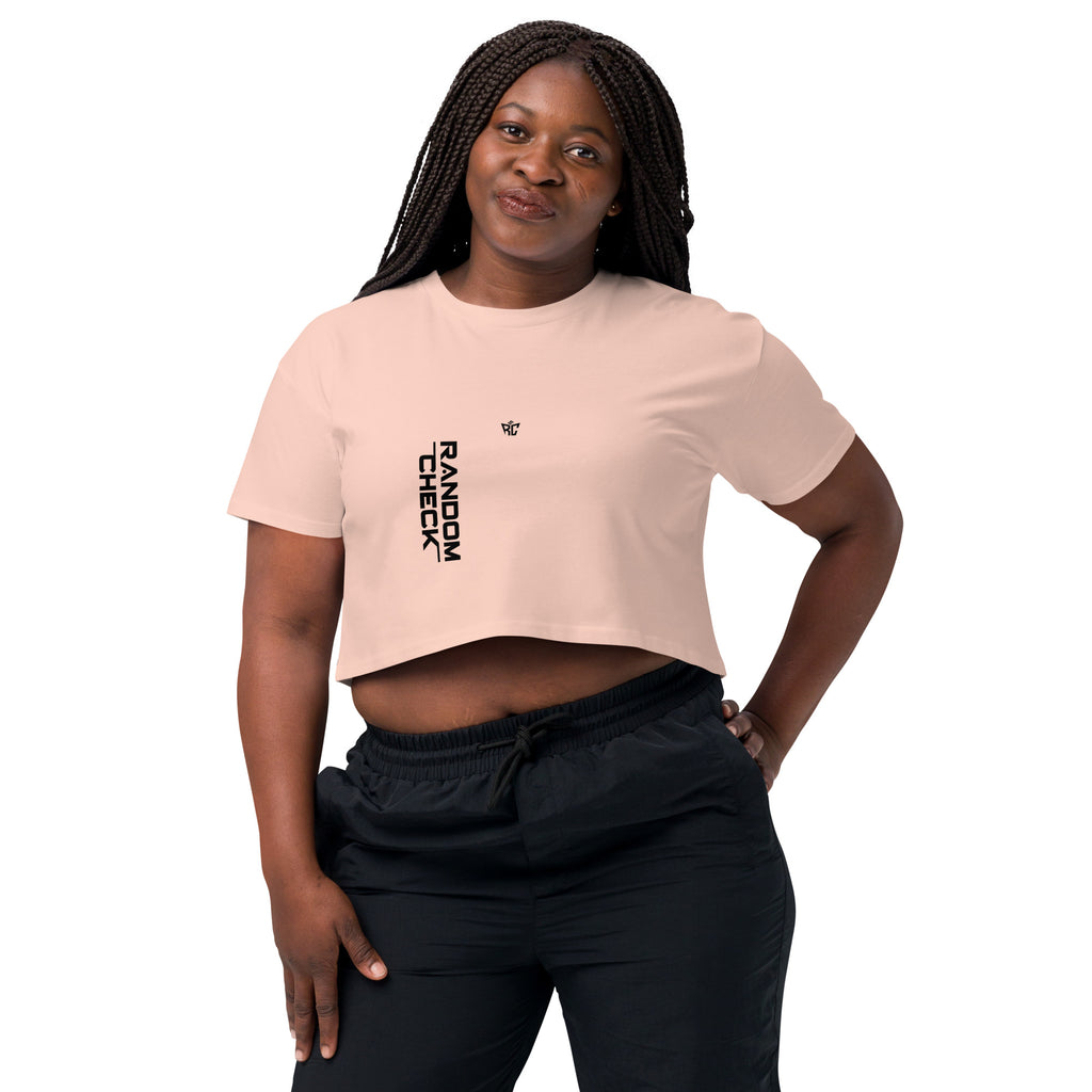 Woman wearing a beige t-shirt with a phoenix design and text on a white background